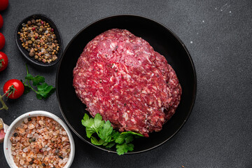 raw beef minced meat ground meat fresh ready to cook meal food snack on the table copy space food background rustic top view