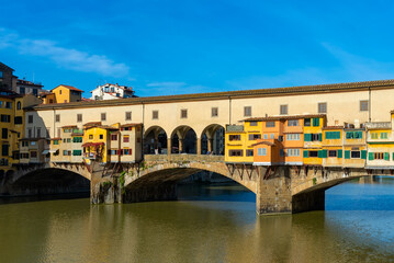 Fototapeta na wymiar Ponte Vecchio over Arno River in Florence, Italy. Architecture and landmark of Florence. Cityscape of Florence