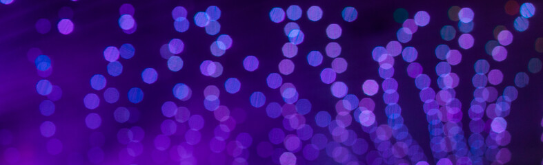 Abstract circular bokeh background, defocused bokeh lights on violet background