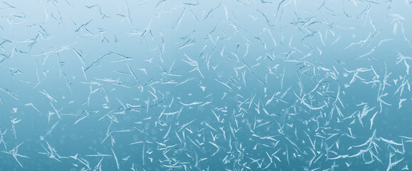 Minimal light backdrop with icy crystals on window in day light. Frosty texture on glass closeup in blue light. Blurry minimalist monochrome background of icy pattern on frozen window glass close up.