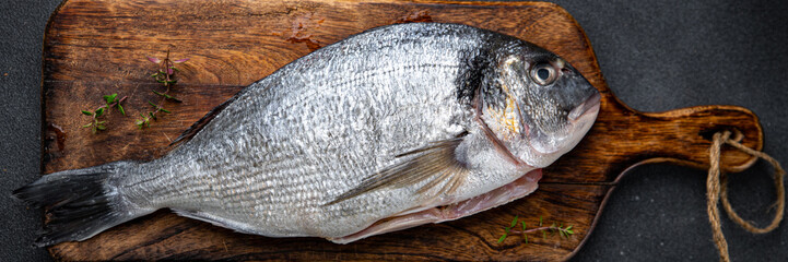 raw fish sea bream fresh seafood meal food snack on the table copy space food background rustic top view 