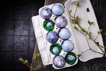 Festive Easter eggs in purple and blue color