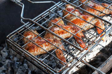 Grilling chicken wings summer rest concept