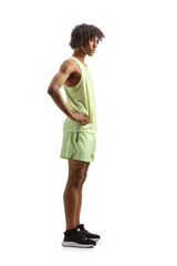 Fototapeta premium Full length profile shot of an african american young man in sportswear