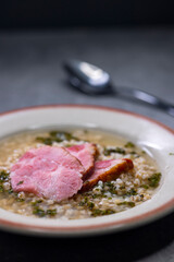 broth with smoked meat and groats