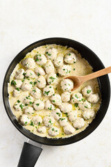 Swedish meatballs with white creamy sauce