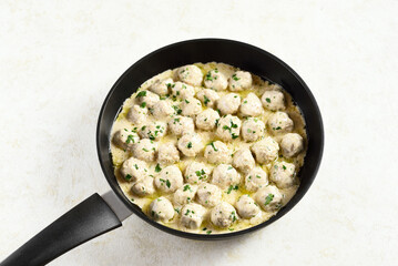 Swedish meatballs with white creamy sauce