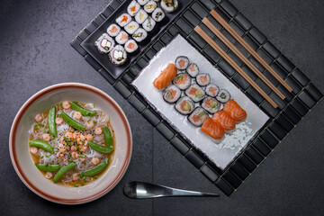 Various dishes of Asian cuisine with typical sushi