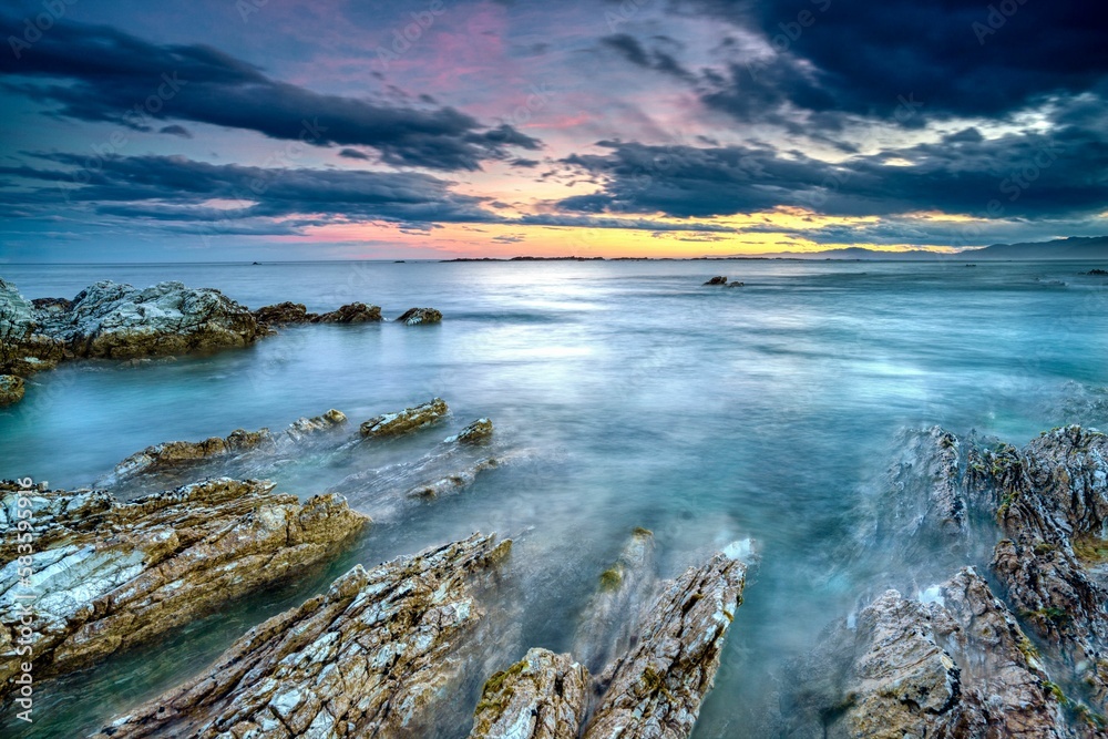 Wall mural setting sun afterglow, kaikoura coast, new zealand