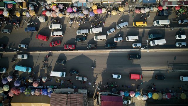 Aerial shot of colorful buses at lorry station in Ghana