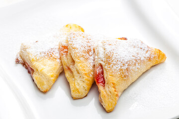 homemade puff pastry filled with strawberry jam