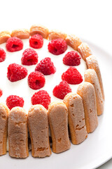 raspberry cream cake with Italian sponge cakes around