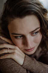 Fototapeta premium Portrait of unhappy young woman, concept of mental health.