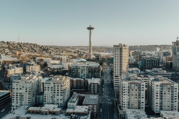Fototapeta premium Aerial view of the Space Needle Tower surrounded by buildings in Seattle