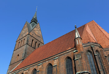 Historic Marktkirche aka Market Church with red roof and Blue Sky in Hannover, Germany