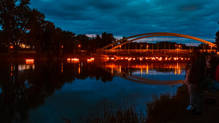 Nepomukfest 2022 at night with reflections at Plattling, Bavaria, Germany