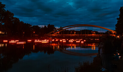 Nepomukfest 2022 at night with reflections at Plattling, Bavaria, Germany