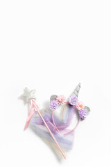 Fairy costume, unicorn on a white background. Top view, flay lay