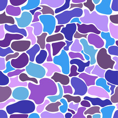 Seamless pattern in blue and purple tones. Pattern with various rounded shapes. Abstract background in vector.