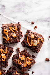 Chocolate caramel brownies on kitchen paper