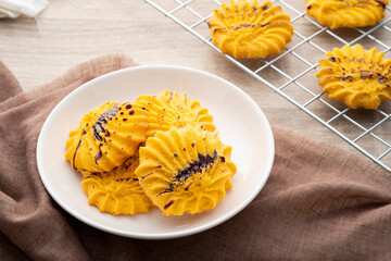 Danish butter cookies on white plate.Closeup with shallow depth of field