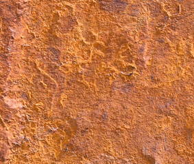 Fondo con detalle y textura de superficie de piedra con tonos marrones de hierro oxidado
