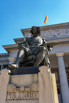 Statue of the painter Velazquez on the main facade of the Prado Museum in Madrid, Spain.