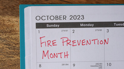 Fire Prevention Month marked on an October 2023 calendar. 