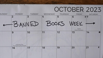 Banned Books Week marked on a calendar for the first week of October 2023. Banned Books Week was launched in 1982 in response to the rising number of challenges to books in schools and libraries.
