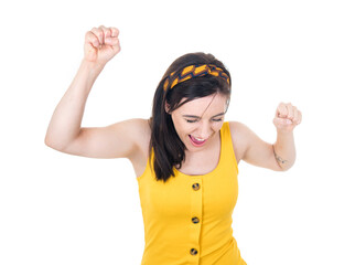 Excited young woman with clenched fist or hands celebrate success, isolated on white background