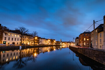 houses reflection river