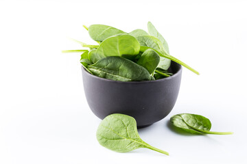 Green spinach on a white background