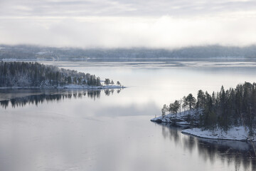 Winter landscape the frozen shores of Jonsvatnet lake near Trondheim, Norway., Europe