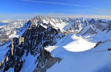 View of the Mont Blanc massif seen from the Aiguille du Midi. French Alps, Europe.