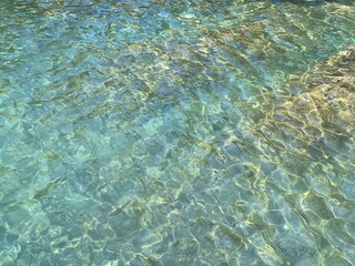 Turquoise sea water clear surface.