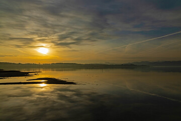 Fototapeta premium view over Chiemsee lake in sunset