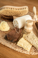 Collection of various cleaning brushes and sponges of various natural materials in home kitchen....