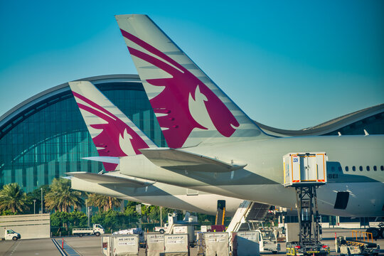 Doha, Qatar - December 12, 2016: Airplanes on the runway of Hamad International Airport