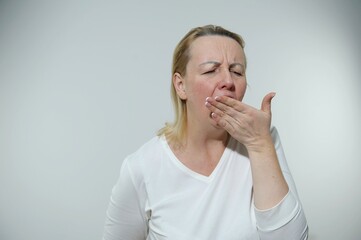 adult woman got sick she ate bad food sick vomit covered mouth with hand or she was coughing a lot real person simple