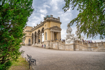 Vienna, Austria - August 20, 2022: Tourists along Schonbrunn Castle Park under Gloriette