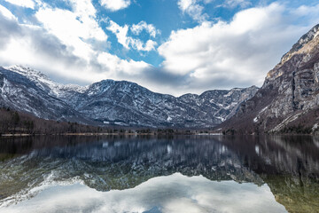 Lake Bohinj in winter in Slovenia against the background of the snowy Alps