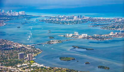 Amazing aerial view of Miami Beach skyline and coastline from a departing airplane