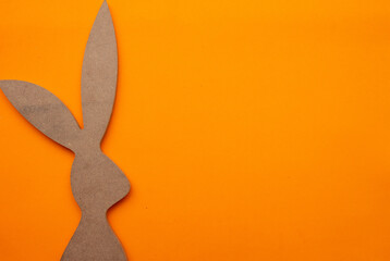 face of easter bunny on an orange background (Easter)