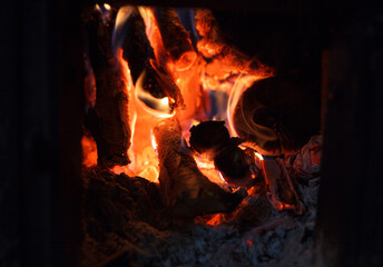 Fire burns in fireplace
