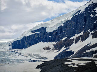 Huge and deep ice shelves overhang the Athabasca Glacier in Jasper National Park