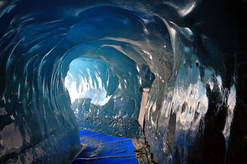 Ice cave in the glacier Mer de Glace ("Sea of Ice"). Mont Blanc massif, in the French Alps.