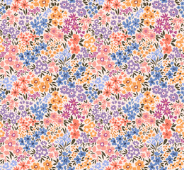 Vector seamless pattern. Cute pattern in small flowers. Small colorful flowers. Ivory white background. Ditsy floral background. The vintage template for fashion prints. Stock vector.