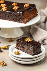 Homemade cake with poppy seeds served on a plate, vertical image. top view. place for text