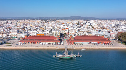 Aerial view of the Portuguese fishing tourist town of Olhao overlooking the Ria Formosa Marine...