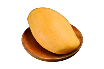 Big mango on a wooden plate, isolated on a white background. Tropical fruit, close-up
